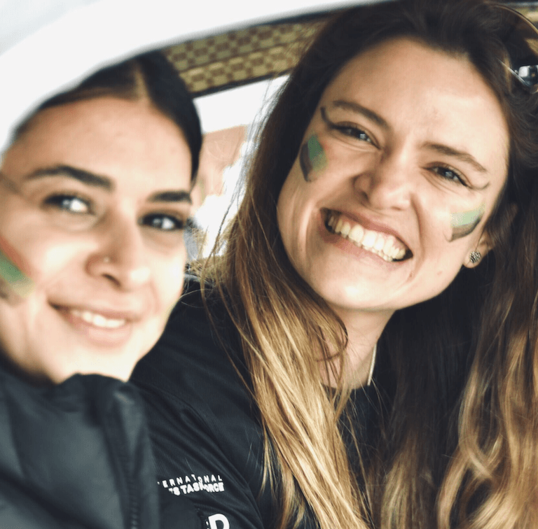 Friends smiling in the tuk tuk