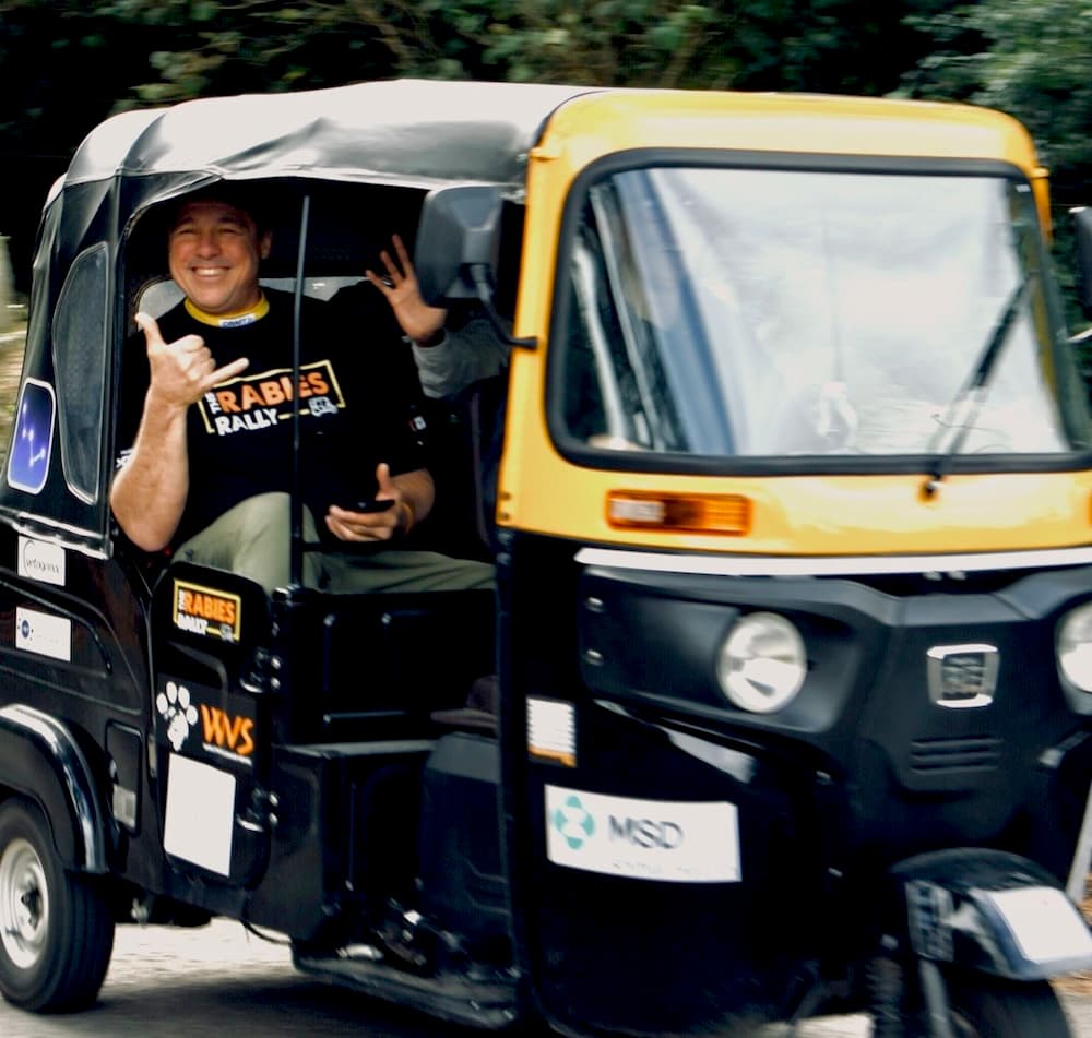 Waving from the tuk tuk